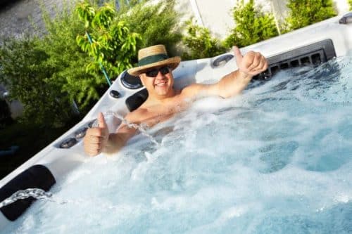 how to stop floating in hot tub